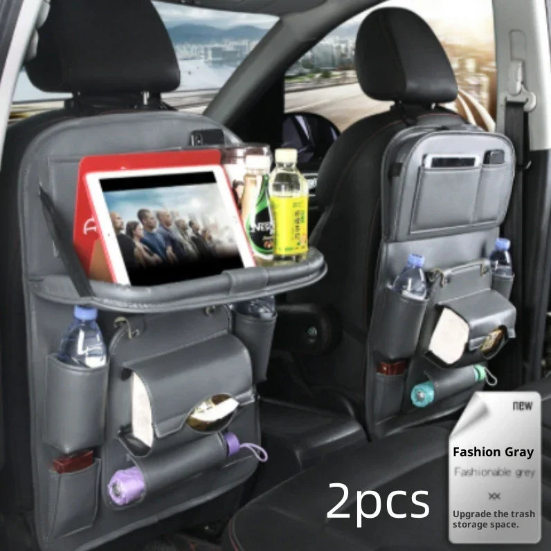 Gray car seat organizers with tablet holder, drink pockets, and storage compartments in back seats