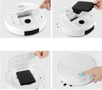 White robot vacuum cleaner with removable dustbin and lid, shown from top with a hand pressing start button