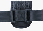 Close-up of black nylon strap with reinforced stitching and durable plastic buckle