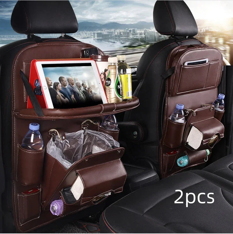 Brown leather car seat organizers with tablet holder, drink pockets, tissue dispenser, and storage compartments