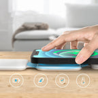 Hand placing smartphone on wireless charger pad on wooden table with charging icons