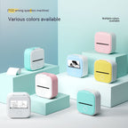 Compact portable mini printers in pastel colors with photo and document print samples on modern platforms
