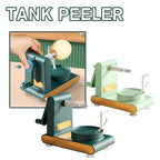 Tank peeler kitchen gadget in green and mint colors, peeling an apple with a hand crank