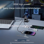 65W high power USB charger charging MacBook, iPhone 14 Pro, and Huawei P50 on desk