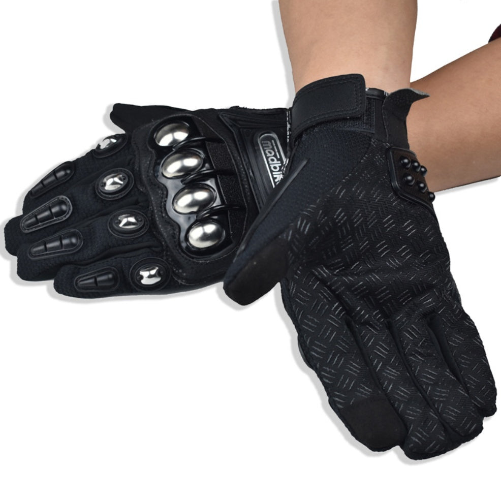 Black tactical gloves with knuckle protection and textured grip worn on hands