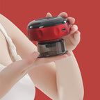 Person holding red and black portable electric lint remover with transparent container against red background