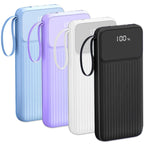 Portable power banks in blue, purple, white, and black with digital battery indicator and wrist strap