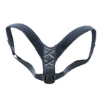 Adjustable black posture corrector brace with padded straps and breathable material
