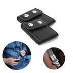 Black leather seat belt buckle protector with silver snap buttons, shown closed and in use