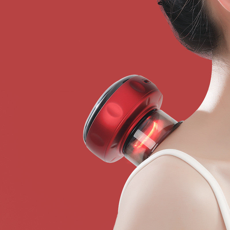 Red handheld electric massager applied to shoulder of person with white strap top on red background