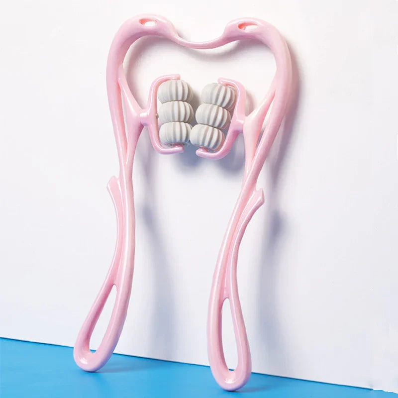 Pink handheld muscle roller with white textured massage balls on blue and white background