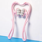 Pink handheld muscle roller with white textured massage balls on blue and white background